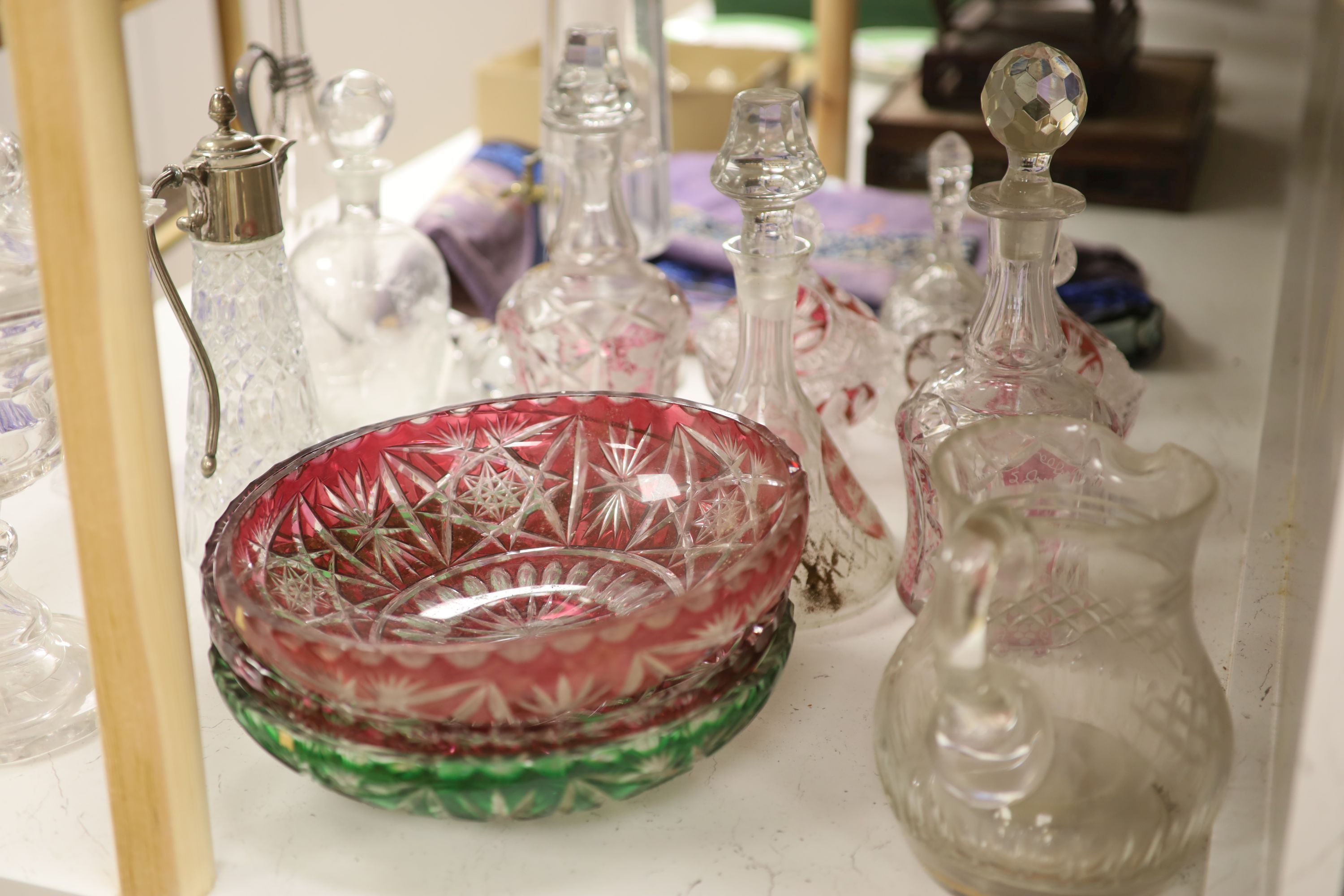 A quantity of mixed, cut, etched and overlaid glass, tallest 54cm